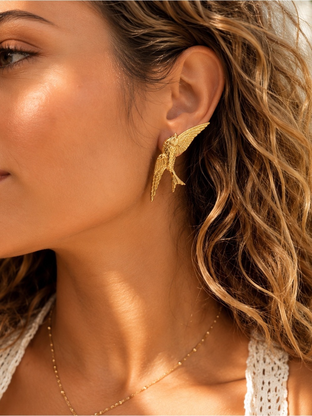 Gold Flying Bird Statement Earrings